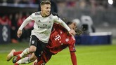 Calciomercato melaporkan Juventus dan Arsenal tengah bersaing untuk mendapatkan tanda tangan bek kiri Benfica, Alejandro