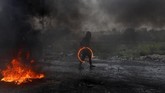 Salah satu faksi perjuangan Palestina di Jalur Gaza, Hamas, mendukung unjuk rasa itu. (REUTERS/Mohamad Torokman)