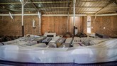Di tengah museum, adalah kuburan massal untuk para korban. Ada sekitar 250 ribu jasad yang dikebumikan di sana. (Jacques NKINZINGABO / AFP)
