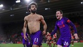 Beruntung Liverpool punya Mohamed Salah. Bintang internasional Mesir itu berhasil membawa The Reds berbalik unggul di menit ke-80. (Reuters/Andrew Couldridge)