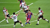 Belajar dari final 2009, Manchester United memberi penjagaan yang lebih kepada Lionel Messi pada final Liga Champions 2011. (AFP PHOTO / GLYN KIRK)