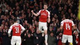 Aaron Ramsey menjadi pembuka kemenangan Arsenal setelah menerima assist dari Ainsley Maitland-Niles. (REUTERS/Ian Walton)