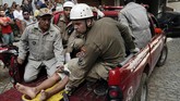 Kota-kota di Brasil, seperti Rio de Janeiro, tidak mempunyai rancangan tata kota yang baik. Alhasil banyak bangunan liar dibangun di lahan yang seharusnya tidak diperuntukkan bagi pemukiman. (AP Photo/Leo Correa)