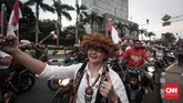 Sementara Litbang Kompas dengan 80,45 persen data masuk per pukul 18.20 WIB, menunjukkan Jokowi-Maruf juga unggul dengan perolehan 54,22 persen suara dan Prabowo-Sandi dengan 45,78 persen suara. (CNN Indonesia/Safir Makki)