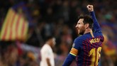 Lionel Messi membawa Barcelona unggul di menit ke-16. Tendangan kaki kiri Messi mengirim bola ke pojok kanan dan tak bisa dijangkau oleh David de Gea. (REUTERS/Sergio Perez)