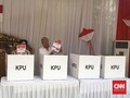 Menteri-menteri Ekonomi Jokowi ke TPS Berbaju Putih