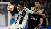Mendapat kepercayaan dari pelatih Massimiliano Allegri menjadi starter saat melawan Ajax Amsterdam, Paulo Dybala hanya bermain 45 menit setelah tampil buruk. Posisinya kemudian digantikan Moise Kean. (Filippo MONTEFORTE / AFP)