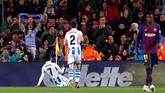Sociedad kemudian sukses mencetak gol penyeimbang pada menit ke-62 melalui gol Juanmi setelah menerima umpan terobosan Mikel Merino. (REUTERS/Albert Gea)