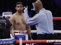 FOTO: Amir Khan Menyerah dan Kalah TKO