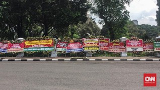 Karangan Bunga 'Kemenangan' Jokowi-Ma'ruf Berjejer di Istana