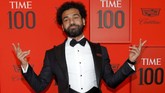 Mohamed Salah berpose di karpet merah. Pemain Liverpool adalah salah satu atlet yang terpilih masuk daftar 100 orang paling berpengaruh versi majalah Time. (REUTERS/Andrew Kelly)