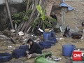 FOTO: Jatinegara Lumpuh Terendam Air