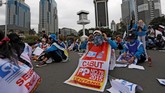 Para buruh yang tergabung dalam Asosiasi Serikat Pekerja Indonesia (ASPEK Indonesia) mengajukan tujuh tuntutan kepada pemerintah (REUTERS/Willy Kurniawan)