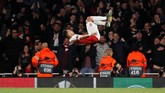 Pierre-Emerick Aubameyang merayakan gol ketiga Arsenal saat melawan Valencia. Skor 3-1 untuk The Gunners bertahan hingga laga usai. (REUTERS/David Klein)