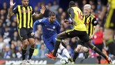 Eden Hazard menjadi bintang Chelsea saat melawan Watford dengan sumbangan dua assist. Kendati demikian Hazard masih diliputi isu pergi dari Chelsea pada akhir musim nanti. (REUTERS/Peter Nicholls)