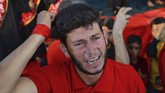 Umum diketahui, agama dan politik saling berkait erat di Irak. Disebutkan sekitar 40 juta penduduk merupakan kaum Syiah, dengan populasi pemuda terlihat menavigasi masyarakat yang semakin modern. (Haidar HAMDANI / AFP)