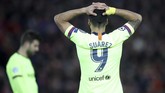 Penyerang Barcelona, Luis Suarez, tidak bisa berbuat banyak di laga ini setelah gagal mengulangi keberhasilan di leg pertama lalu dengan mencetak satu gol ke gawang Alisson Becker. (Action Images via Reuters/Carl Recine)