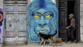 Ratusan seniman grafiti telah mengubah kota pelabuhan Valparaiso di Chile menjadi galeri seni terbuka raksasa
