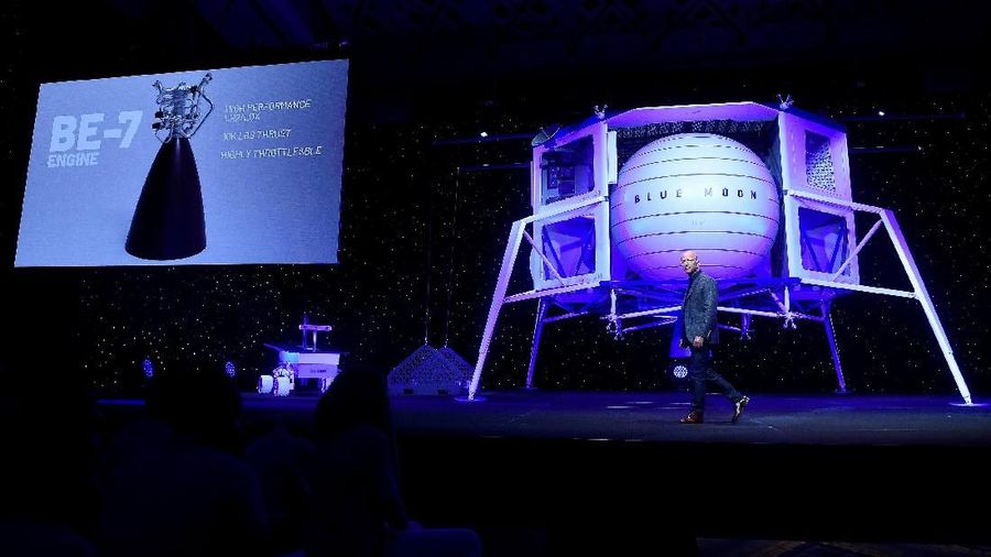 Founder, Chairman, CEO and President of Amazon Jeff Bezos unveils the BE-7 rocket engine that his space company Blue Origin's space exploration lunar lander rocket called Blue Moon will use during an unveiling event in Washington, U.S., May 9, 2019. REUTERS/Clodagh Kilcoyne