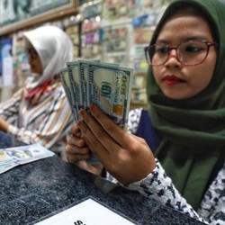 Penutupan Pasar: Rupiah Menguat ke Rp 14.260/US$