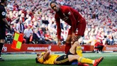 Bek tengah Liverpool, Virgil van Dijk, sebagai tembok kokoh pertahanan The Reds. Berkat ketangguhannya, Liverpool jadi tim paling sedikit kebobolan di Liga Inggris. (REUTERS/Phil Noble)