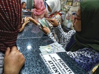 Penutupan Pasar: Rupiah Stagnan Rp 14.415/US$