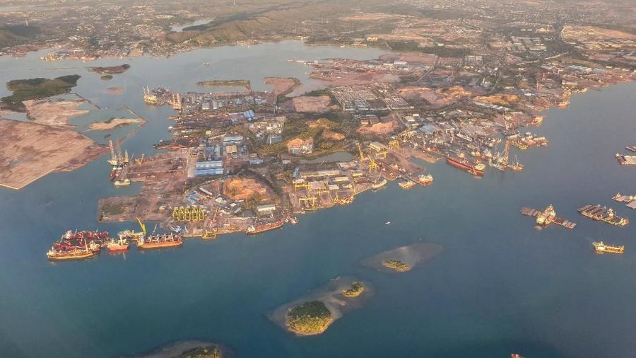 A view of shipyards, seen through a window, in Batam, Indonesia, April 3, 2019. Picture taken on April 3, 2019. REUTERS/Henning Gloystein