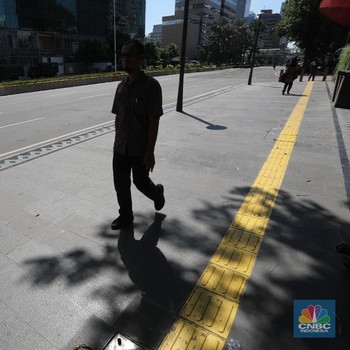 Penampakan Karyawan Seputaran Thamrin yang Ramai-ramai Pulang