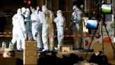 Mereka merilis foto terduga pelaku. Dalam foto itu, pelaku memakai celana pendek berwarna cerah dengan atasan lengan pendek gelap. (Reuters/Emmanuel Foudrot)