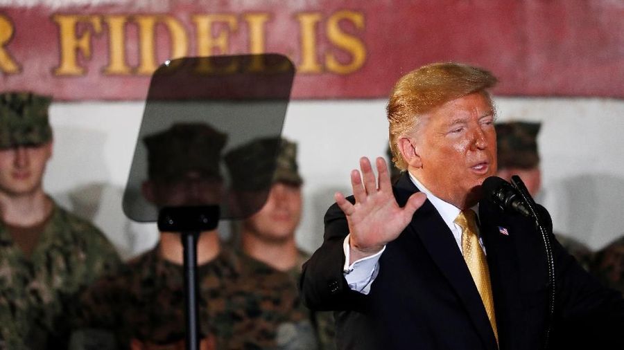 Trump menyebut hubungannya dengan Beijing baik namun penuh ujian setelah China mundur dari komitmen dalam kesepakatan dagang kedua negara.