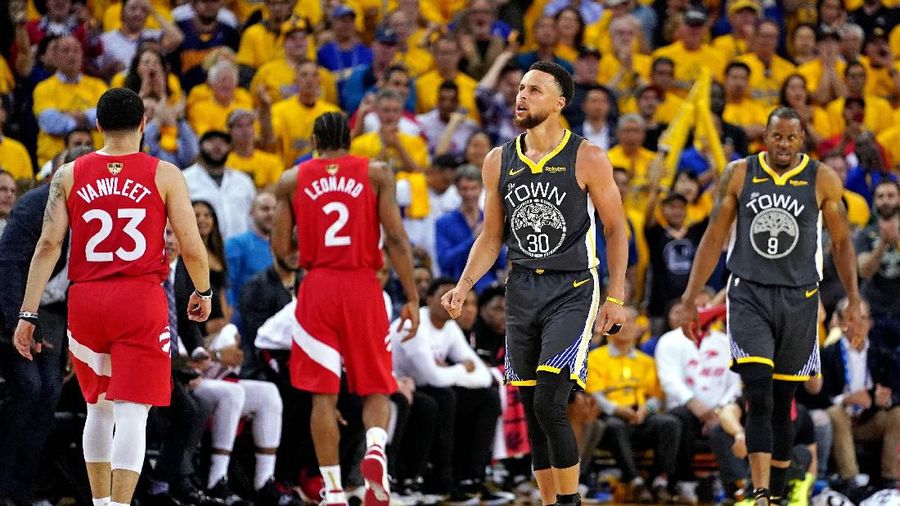 Jun 13, 2019; Oakland, CA, USA; Golden State Warriors guard Stephen Curry (30) and guard Andre Iguodala (9) react during the third quarter against the Toronto Raptors in game six of the 2019 NBA Finals at Oracle Arena. Mandatory Credit: Kyle Terada-USA TODAY Sports