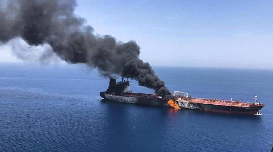 An oil tanker is on fire in the sea of Oman, Thursday, June 13, 2019. Two oil tankers near the strategic Strait of Hormuz were reportedly attacked on Thursday, an assault that left one ablaze and adrift as sailors were evacuated from both vessels and the U.S. Navy rushed to assist amid heightened tensions between Washington and Tehran. (AP Photo/ISNA)