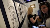Selain cuitan 'covfefe', salah satu cuitan kontroversial Trump yang menyebut 'Daftar 100 Orang Paling Berpengaruh versi Time' sebagai sebuah lelucon juga turut mengisi koleksi museum. (REUTERS/Carlos Barria)
