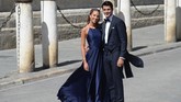 Penyerang timnas Spanyol dan Atletico Madrid Alvaro Morata hadir bersama sang istri, Alice Campello. Beberapa hari sebelumnya Sergio Ramos memberi Morata kesempatan penalti saat melawan Swedia. (CRISTINA QUICLER / AFP)