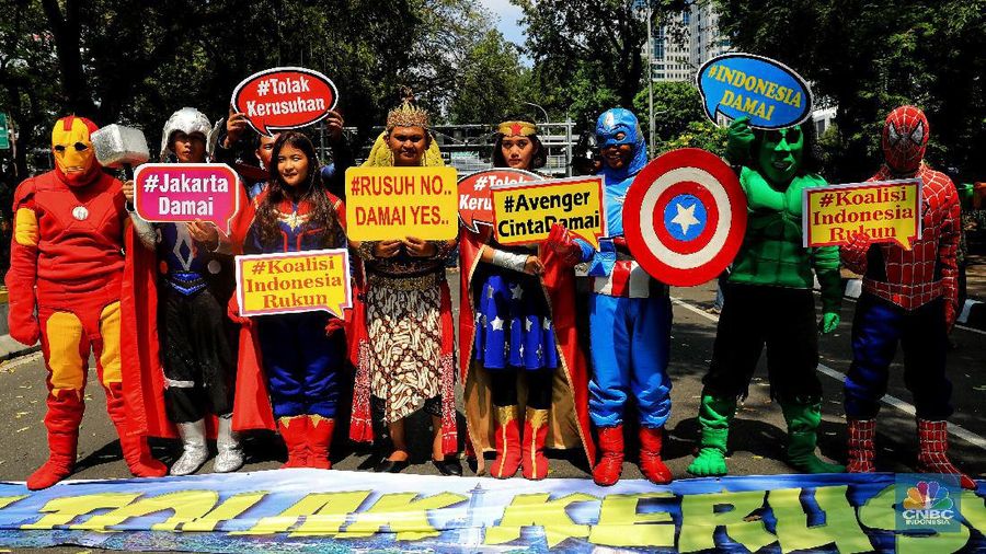 Mereka yang tergabung dalam Koalisi Indonesia Rukun berdemo untuk menolak kerusuhan.