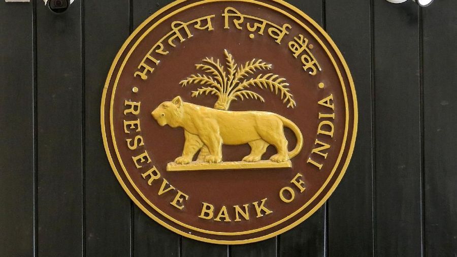 FILE PHOTO: CCTV cameras are seen installed above the logo of Reserve Bank of India (RBI) inside its headquarters in Mumbai, India, Feb. 7, 2019. REUTERS/Francis Mascarenhas/File Photo