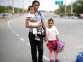 FOTO: Ratapan Perempuan Venezuela yang Terempas Krisis