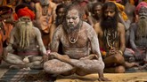 Penganut Hindu melakukan yoga untuk memperingati Hari Yoga Internasional di Kuil Kamakhya, Gauhati, India, Jumat (21/6). (AP Photo/Anupam Nath)
