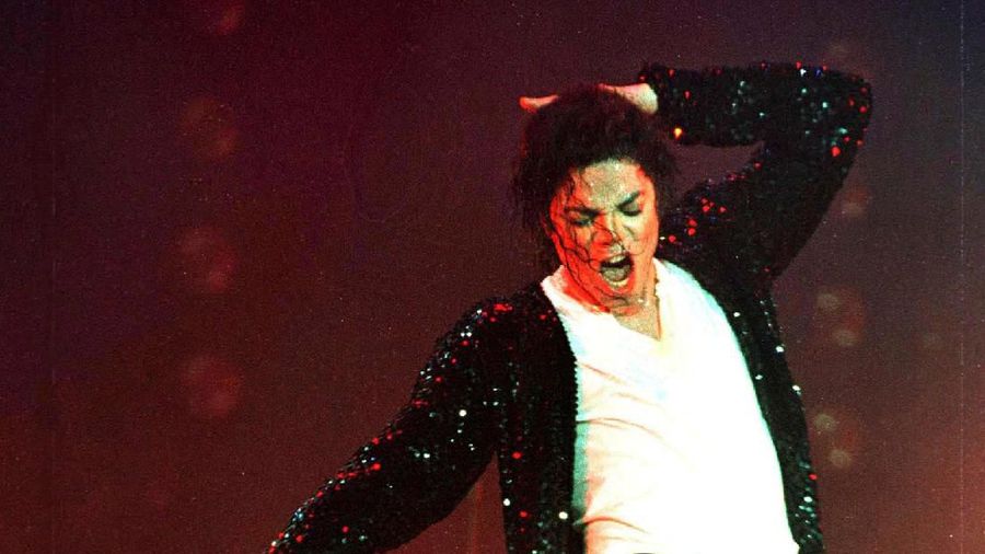 FILE PHOTO: Pop star Michael Jackson performs at Jerudong Park in Bandar Seri Begawan, Brunei, July 16, 1996. REUTERS/David Loh/File Photo PLEASE SEARCH 