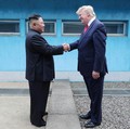 U.S. President Donald Trump shakes hands with North Korean leader Kim Jong Un as they meet at the demilitarized zone separating the two Koreas, in Panmunjom, South Korea, June 30, 2019. KCNA via REUTERS    ATTENTION EDITORS - THIS IMAGE WAS PROVIDED