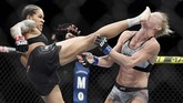 Para perebutan gelar juara dunia kelas bantam antara juara bertahan Amanda Nunes vs Holly Holm juga berlangsung di UFC 239. Nunes menang TKO di ronde pertama lewat tendangan yang tepat ke wajah. (REUTERS/Stephen R. Sylvanie-USA TODAY Sports)