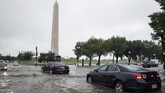 Banjir bandang menerjang sebagian wilayah Washington pada Senin (8/7) waktu setempat. (AP Photo/Alex Brandon)
