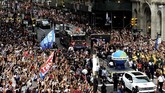 Parade juara timnas Amerika Serikat juara Piala Dunia Wanita 2019. Megan Rapinoe dan kawan-kawan sukses mengalahkan Belanda 2-0 di final. (REUTERS/Mark Kauzlarich TPX IMAGES OF THE DAY)