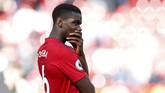 Baru-baru ini, gelandang Manchester United Paul Pogba tak mau menjawab pertanyaan media soal rumor transfernya. Real Madrid dan Juventus jadi dua klub yang mendekati pemain Prancis ini. ( REUTERS/Andrew Yates)