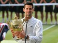 Djokovic Makan Rumput Usai Tekuk Federer di Final Wimbledon