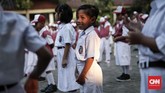 Wajah semangat siswa baru di hari pertama sekolah di SD Negeri Karet 01, Jakarta, 15 Juli 2019. (CNNIndonesia/Safir Makki)
