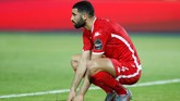 Pemain Tunisia Yassine Meriah meratapi kegagalan timnya di perebutan tempat ketiga Piala Afrika. (REUTERS/Mohamed Abd El Ghany)