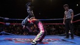 Seperti WWE, gulat versi Malaysia ini lebih menyerupai sebuah pertunjukan teater dibanding olahraga karena atlet saling berhadapan satu sama lain dengan hasil pertandingan yang sudah ditentukan sebelumnya. (Mohd RASFAN / AFP)