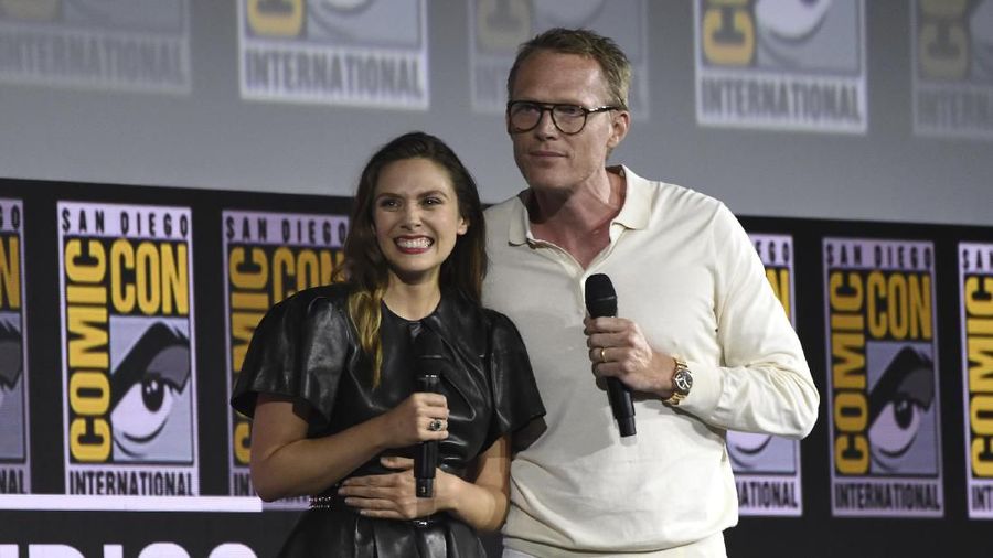 Elizabeth Olsen, left, and Paul Bettany participate in the 