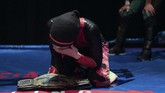 Nor Diana menikmati kesuksesan terbesarnya pada awal Juli lalu dengan mengalahkan empat pegulat pria untuk dinobatkan sebagai juara gulat Malaysia. (Mohd RASFAN / AFP)